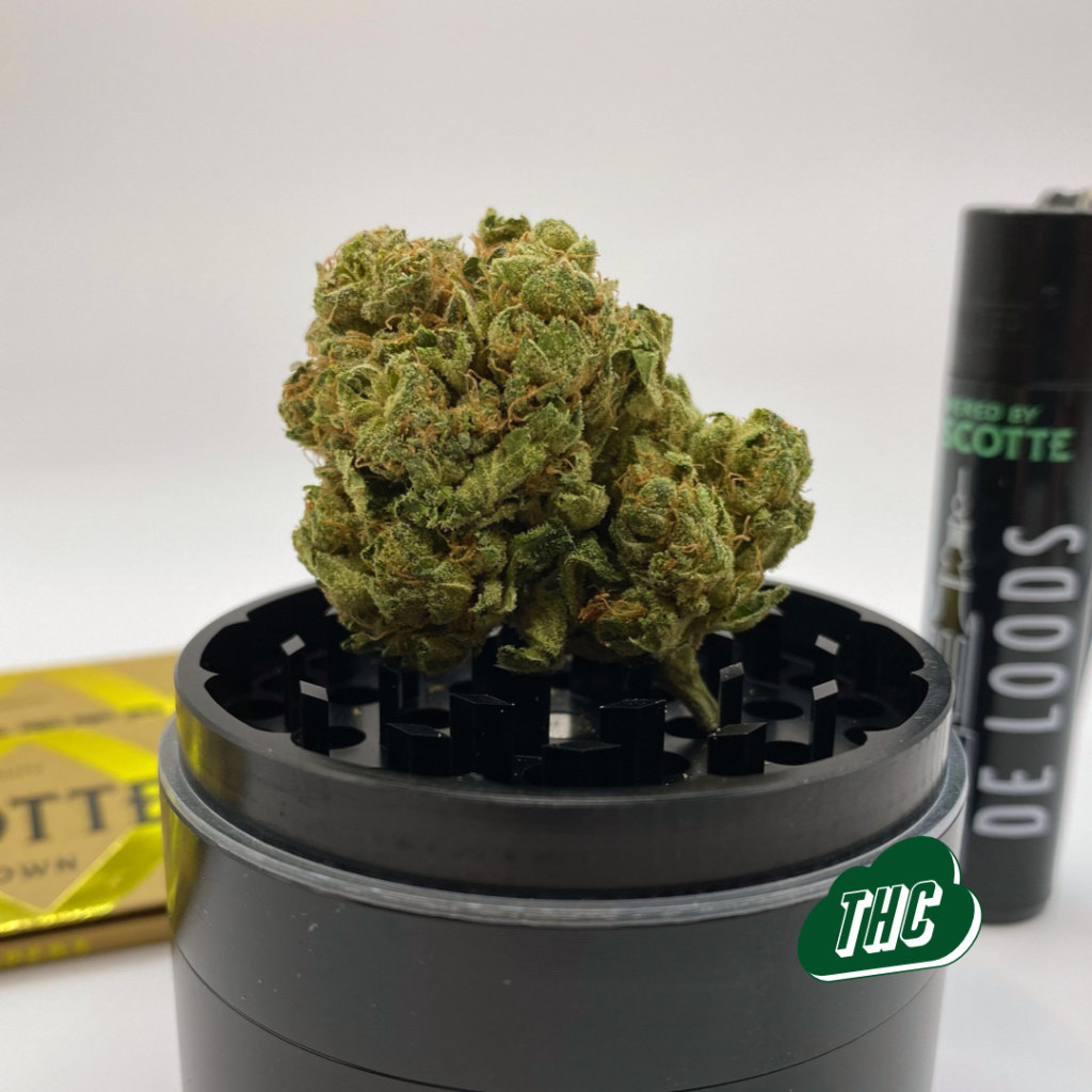 strawberry banana bud on grinder lighter
